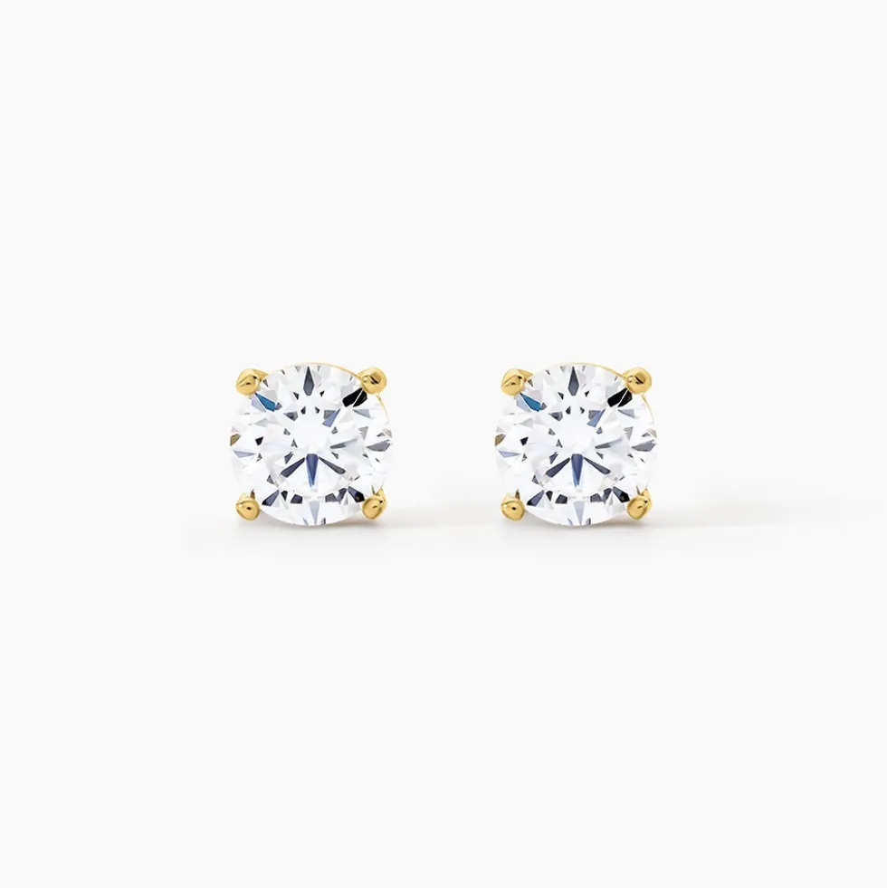 Boucles D'oreilles Puces Phebus Him Acier Doré Oxyde De Zirconium
